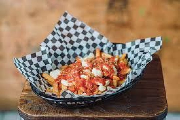 Did quebec invent poutine?