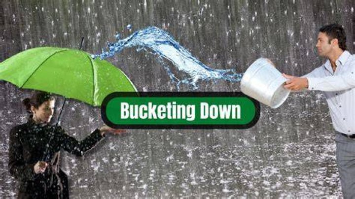 Is bucketing down an idiom?