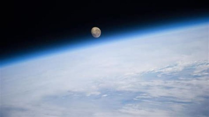 Is moon going far from earth?