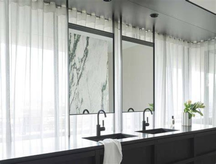 Should mirrors face windows?