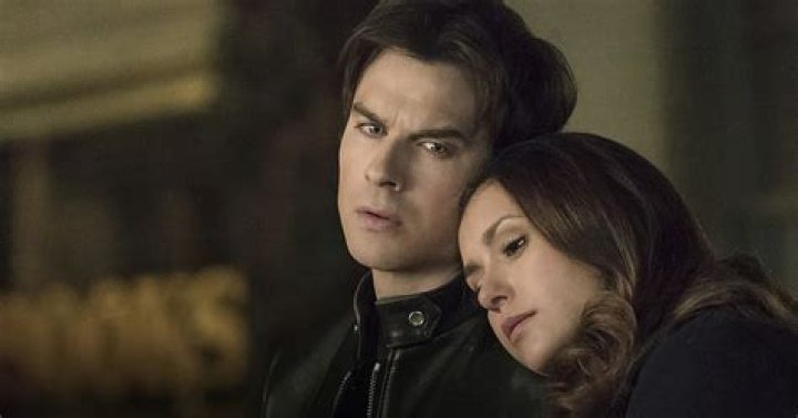 Why do damon and elena get together?