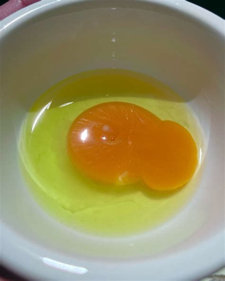 Why is my egg white green?